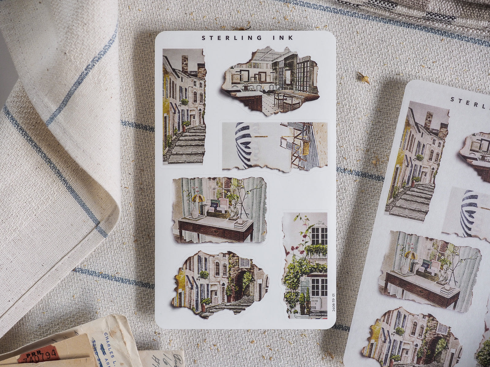 Torn paper sticker set featuring whimsical, sepia-toned sketches of historic European architecture, Parisian streets, and charming city scenes.