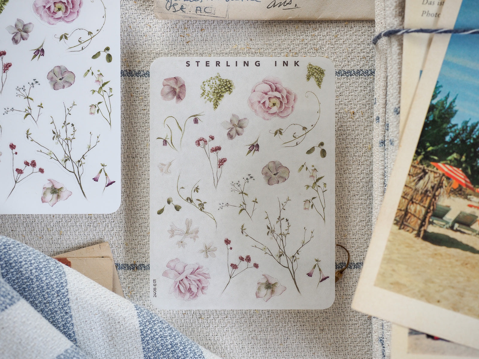 Pastel watercolor sticker sheet featuring delicate botanical elements, including blooming roses, wildflowers, and stems, perfect for decorating journals.