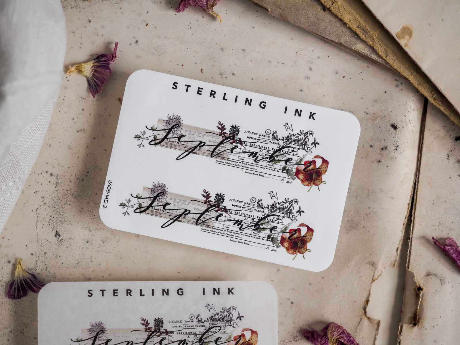 Elegant white monthly planner sticker for September 2024, featuring delicate watercolor botanicals and structured journaling lines for scrapbooking.