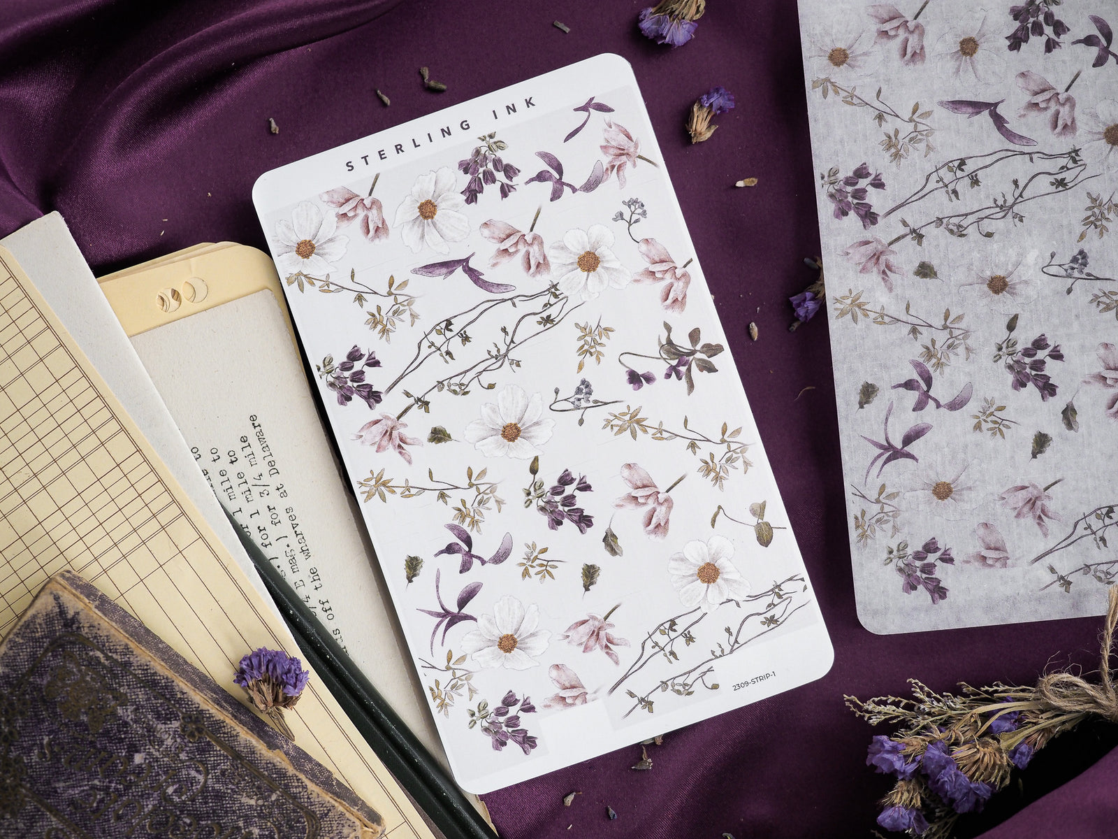Thin strip stickers featuring a delicate botanical pattern of watercolor white and blush flowers intertwined with fine green foliage and brown stems.