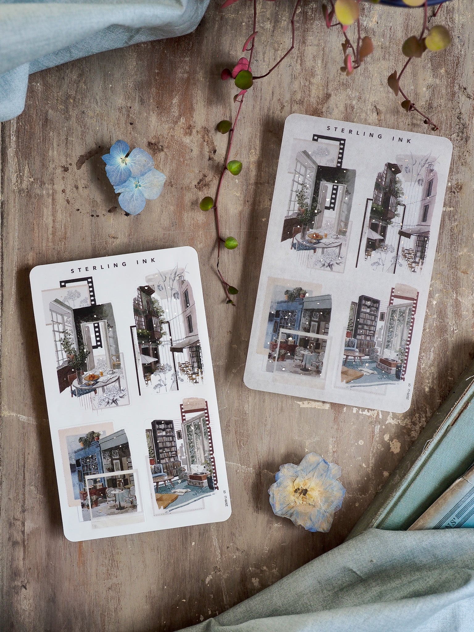 Detailed sticker sheets featuring black and white architectural collage art of classic Parisian and urban cityscapes.