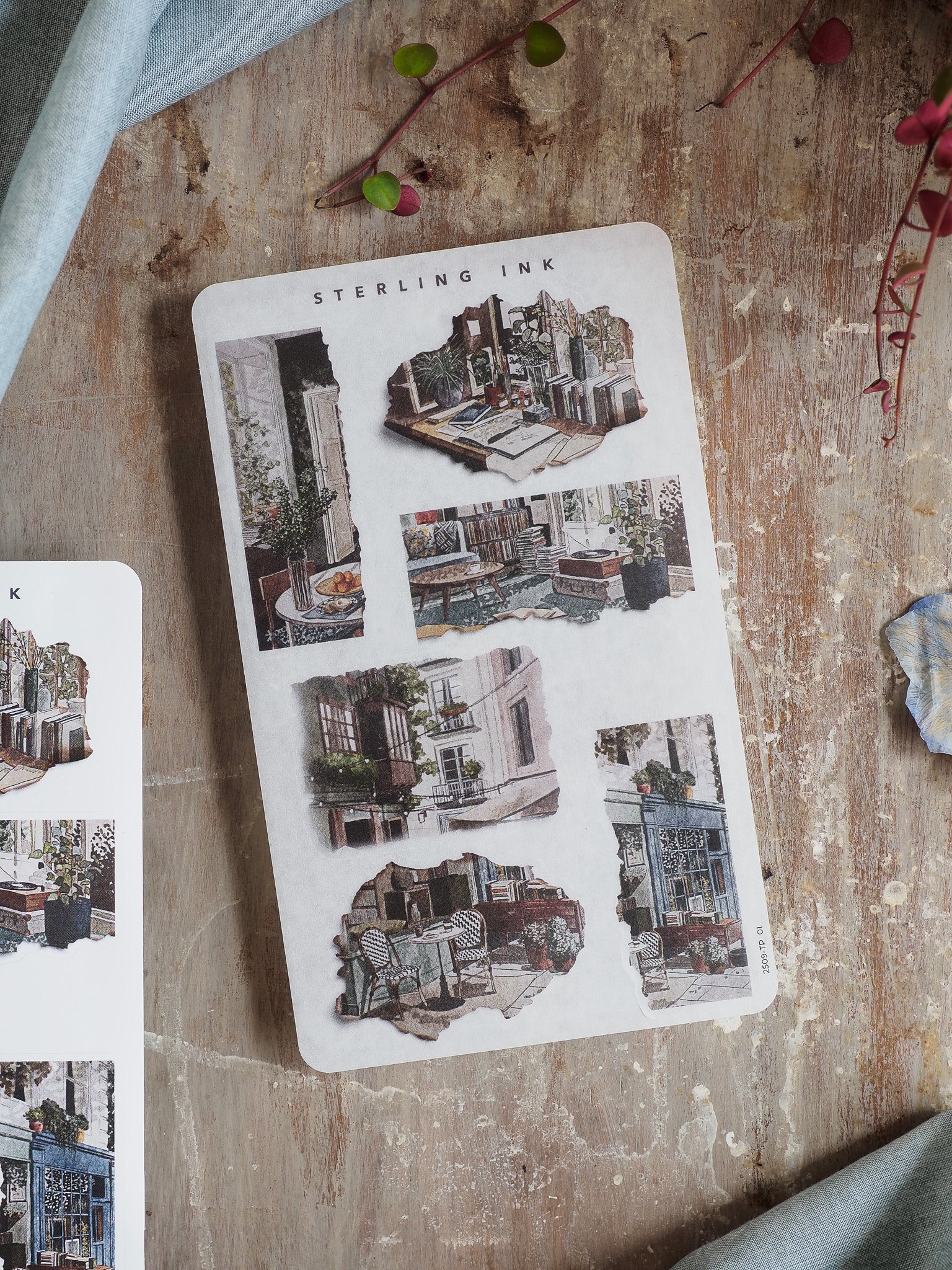 Detailed sheet of torn paper stickers featuring vintage, sepia-toned architectural illustrations of quaint European city streets and historical buildings.