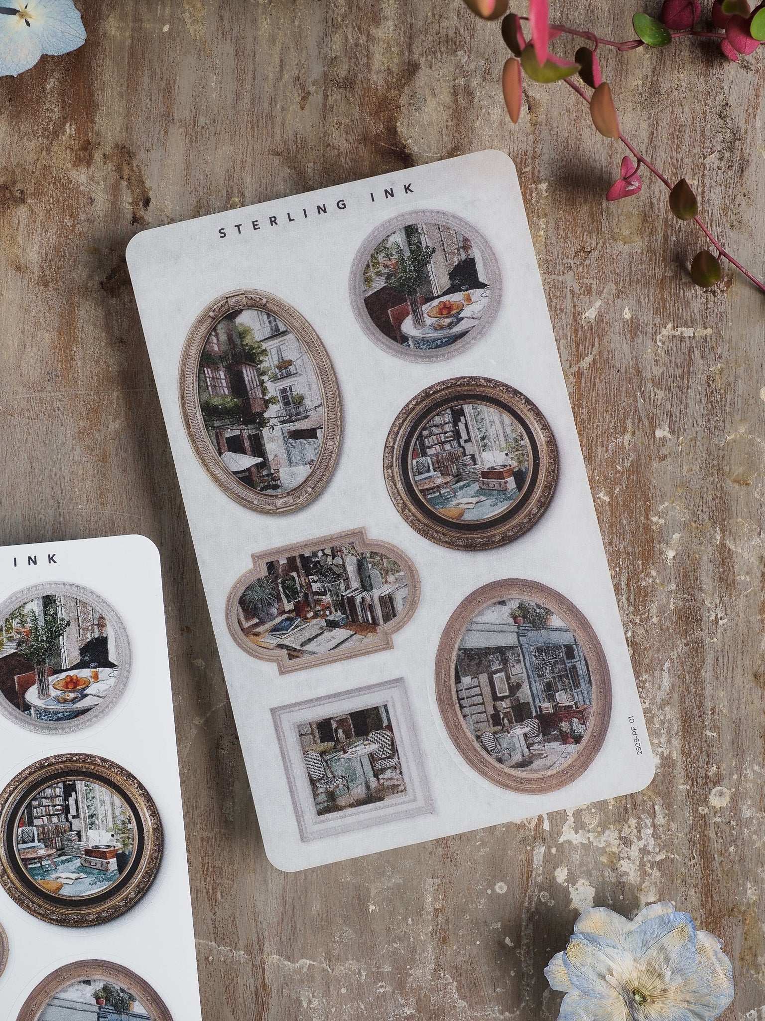 Vintage sepia-toned picture frame stickers depicting detailed, nostalgic urban street views and architectural photos for scrapbooking.