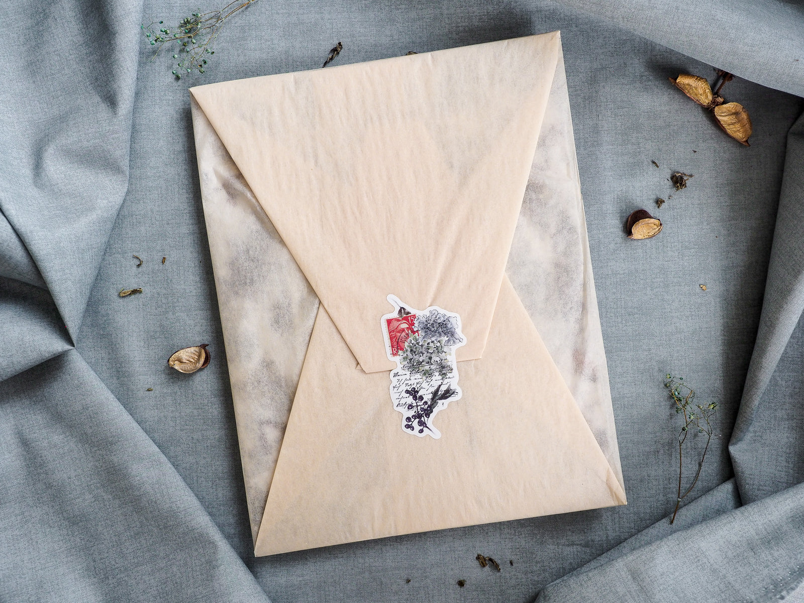 Intricate seasonal die-cut design featuring botanical black line art of autumn foliage, berries, and fall natural elements.