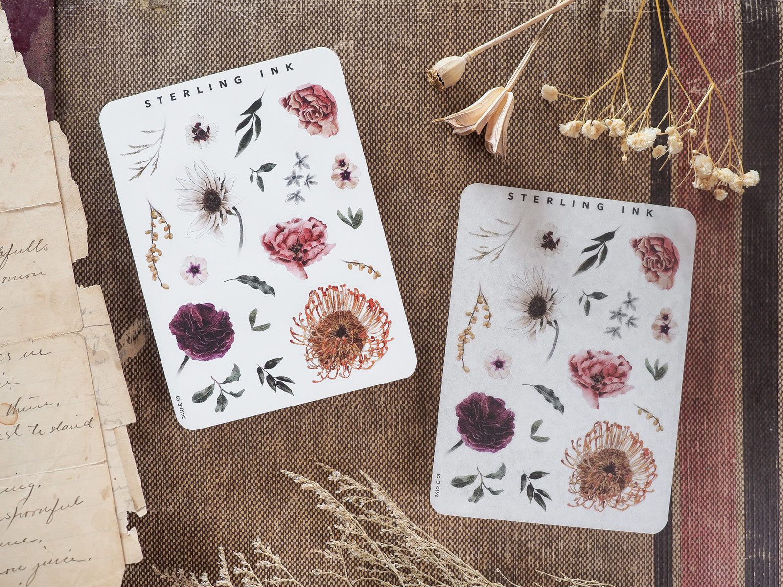 Sticker sheets featuring autumnal botanical illustrations of detailed flowers, leaves, and rustic natural elements.
