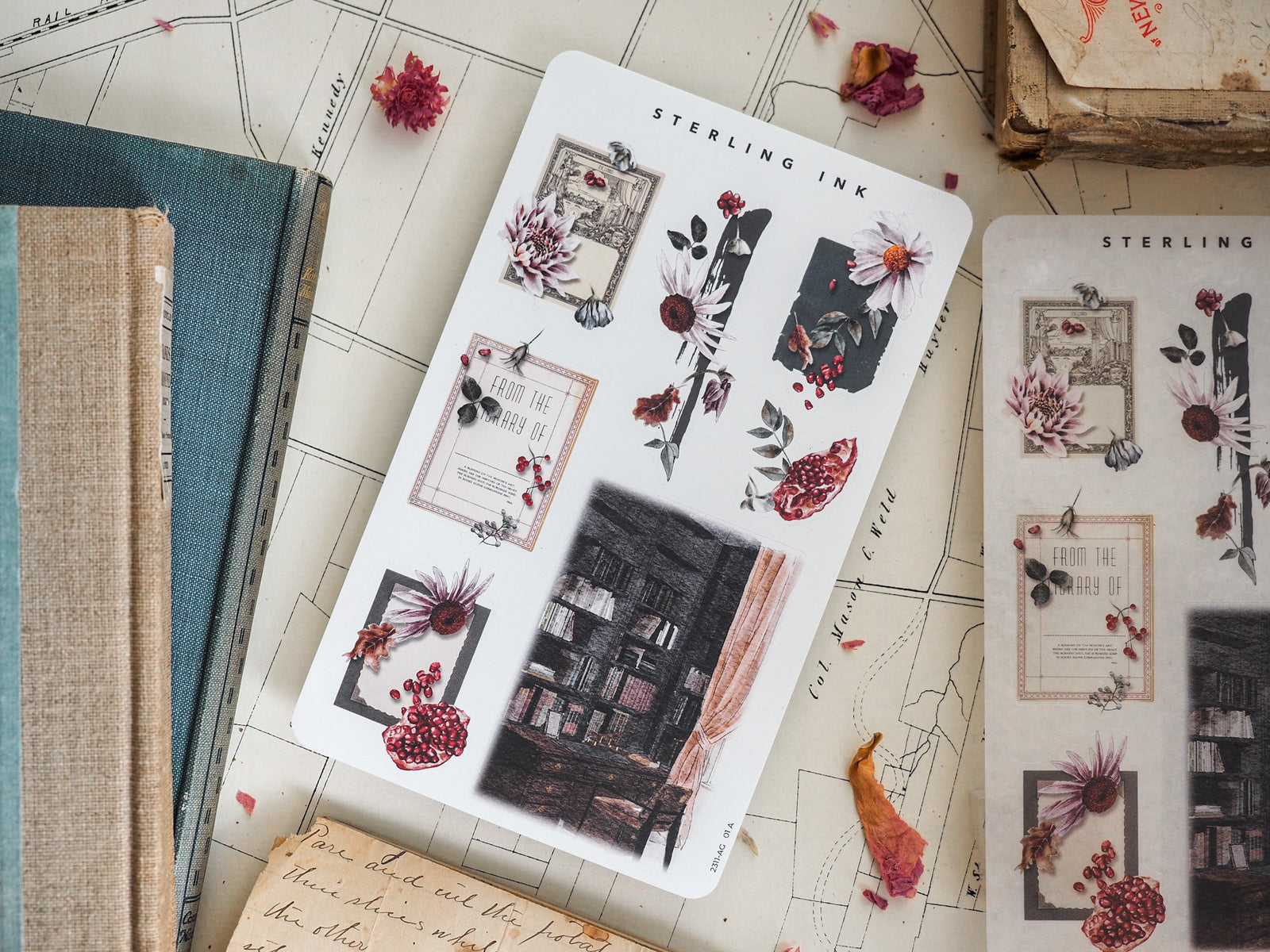 Decorative sticker sheet featuring deep burgundy and muted floral arrangements, botanical decals, and a moody black-and-white library image for journaling.