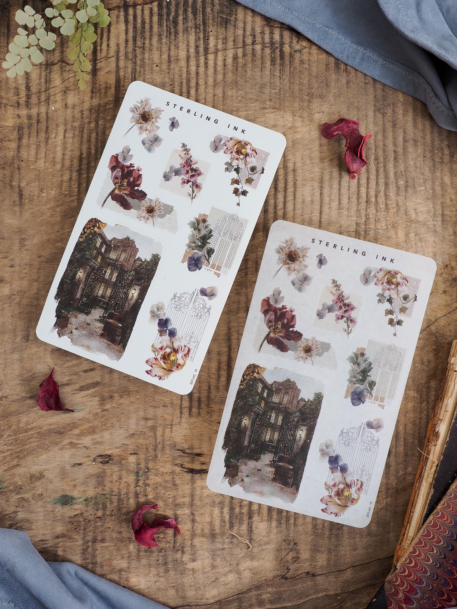 Decorative sticker sheet displaying vintage architectural vignettes and elegant bouquets of muted fall-toned flowers and rich foliage.