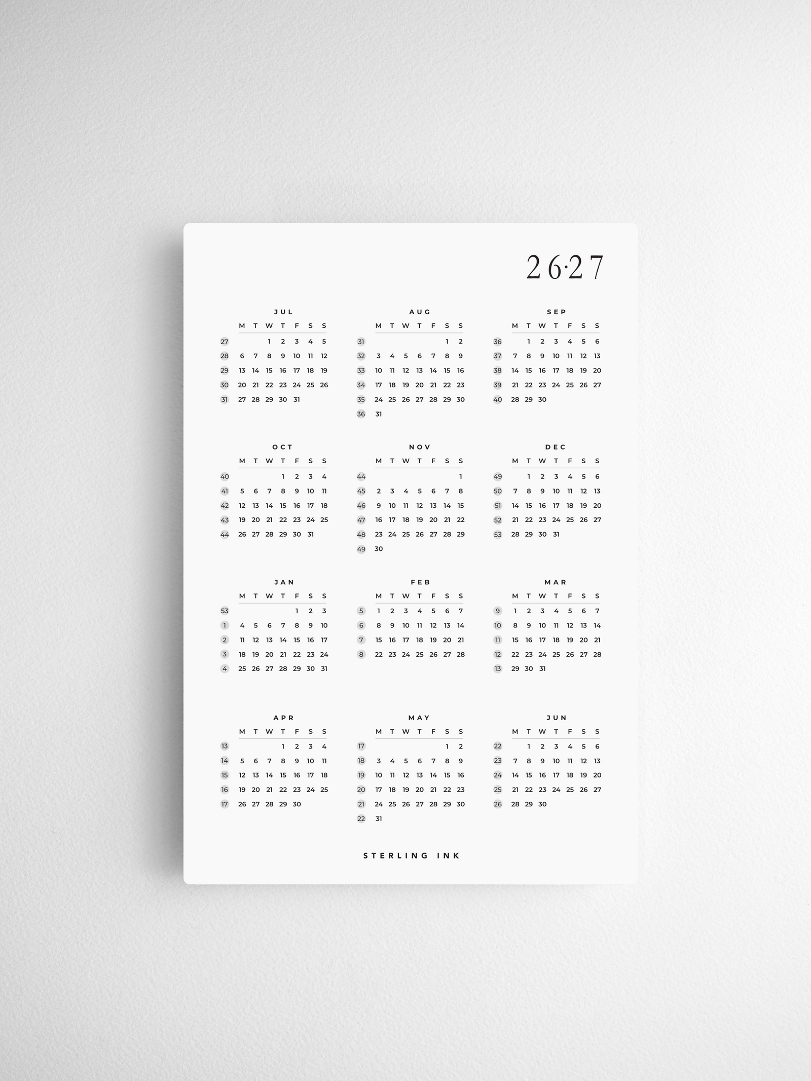Minimalist A5 desk calendar cards for 2026-2027, featuring a clean black and white grid design for organizing monthly dates and daily planning.
