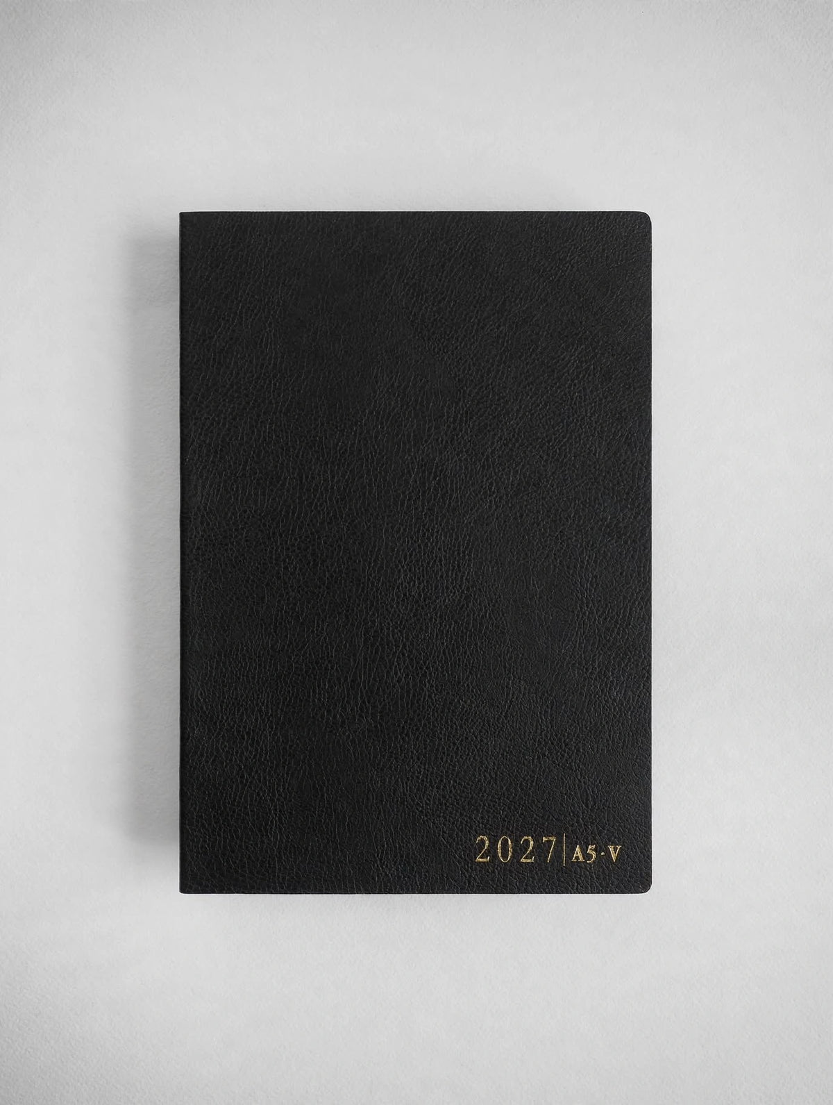 2027 A5 Vertical Core planner interior layout in Onyx #color_onyx