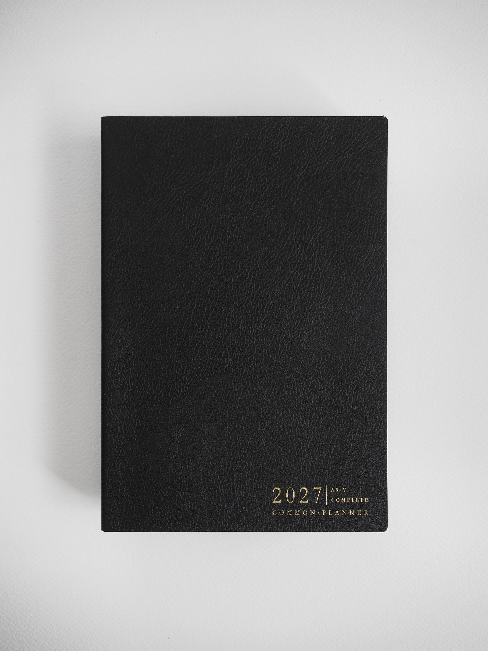 2027 A5 Vertical Complete planner interior layout in Onyx #color_onyx