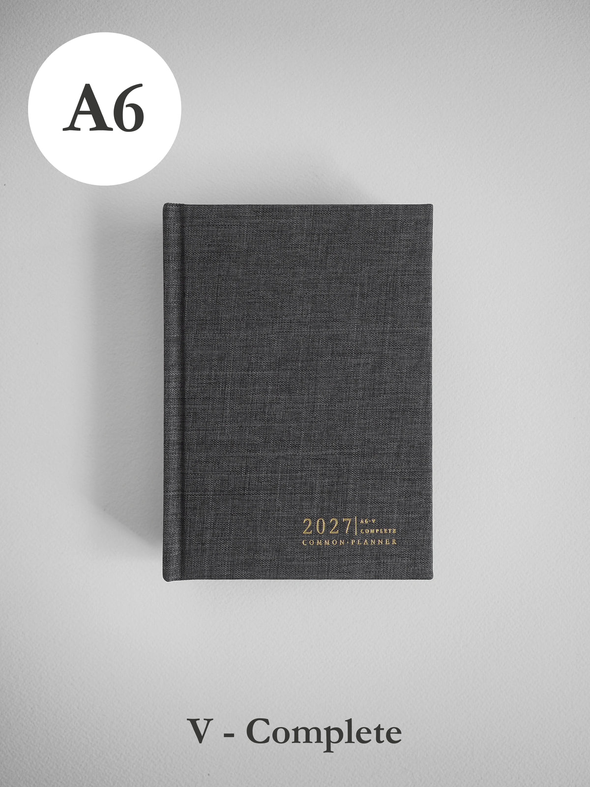 2027 A6 Vertical Complete (hardcover) planner front cover in Charcoal #color_charcoal