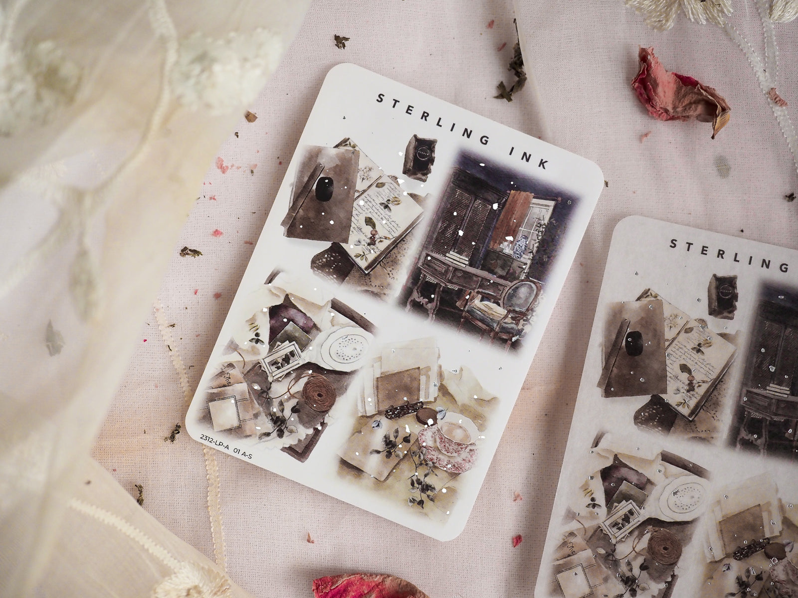 Vintage monochrome illustration stickers featuring aged, dark architectural scenes and scattered decorative silver foil accents from December 2023.