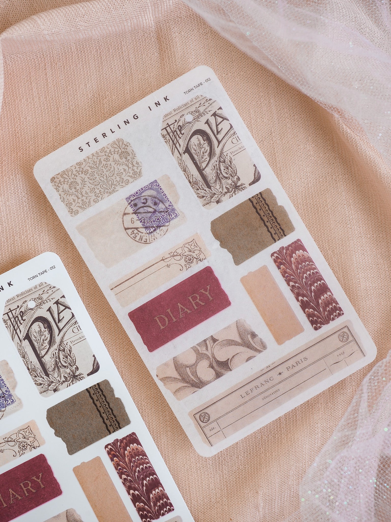 Vintage-themed collection of torn decorative tapes featuring distressed paper, ornate borders, stamps, and sepia-toned journaling elements for crafting.
