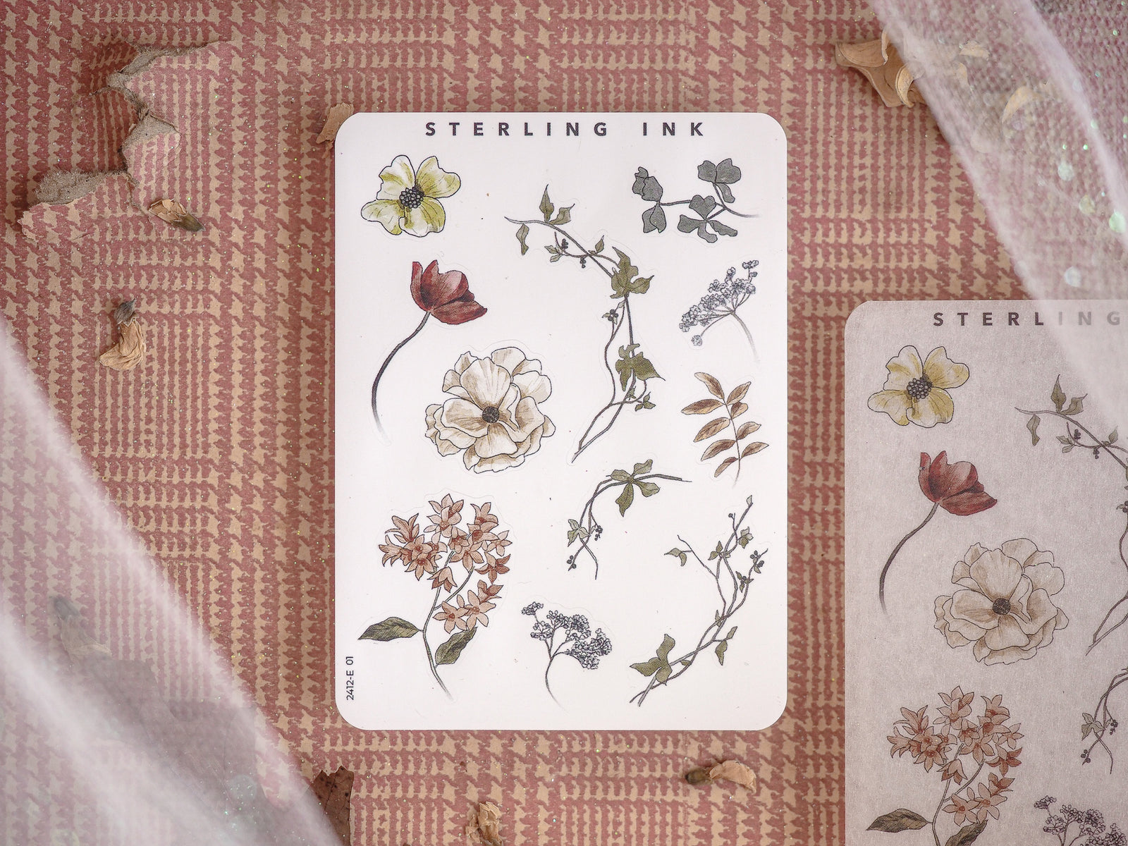 A beautiful collection of vintage botanical elements, featuring diverse hand-drawn flowers, leaves, and stems in soft, muted natural tones.