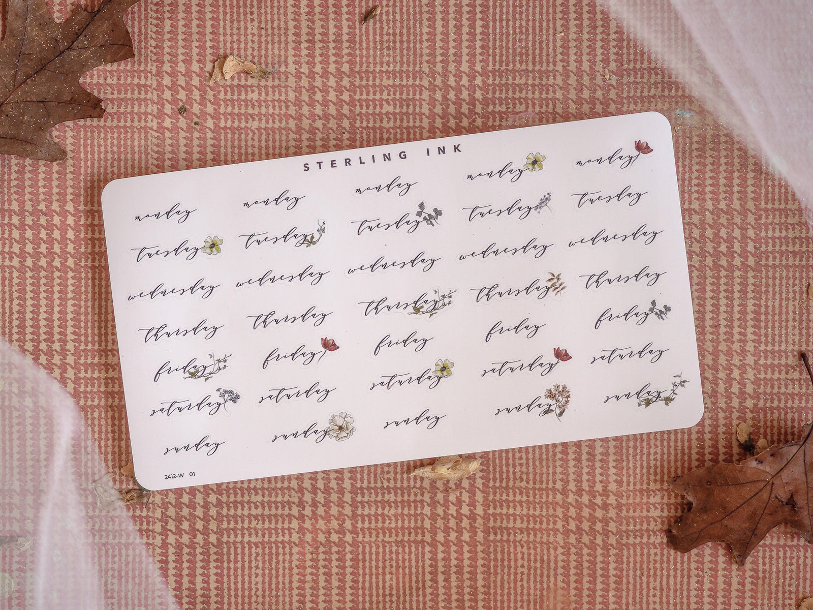 Elegant white sticker sheet featuring a detailed, hand-lettered floral calligraphy pattern listing every weekday from Monday through Sunday.