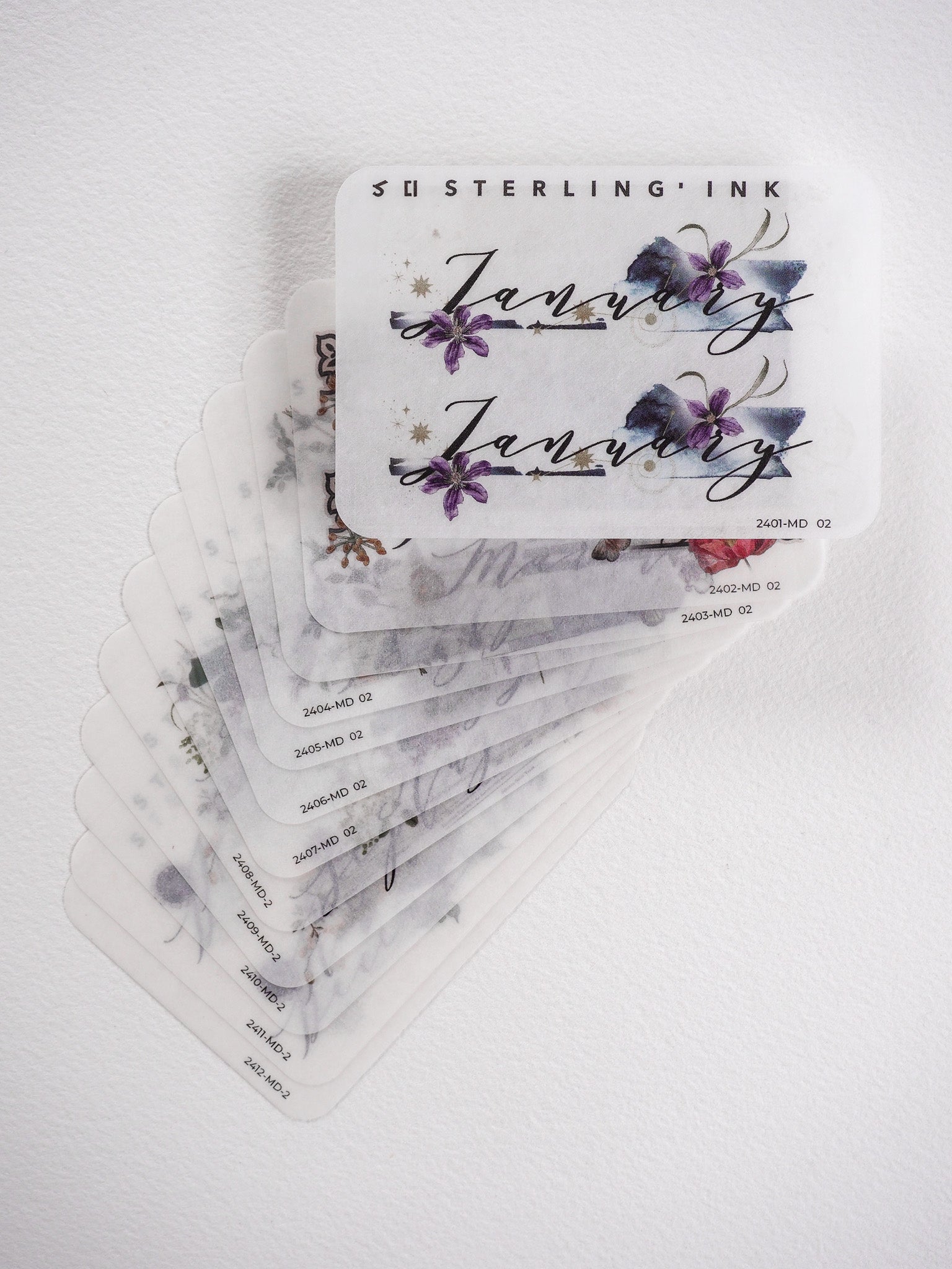 Elegant monthly sticker set for planners, featuring sophisticated calligraphy and delicate lavender floral designs for journaling and seasonal tracking.