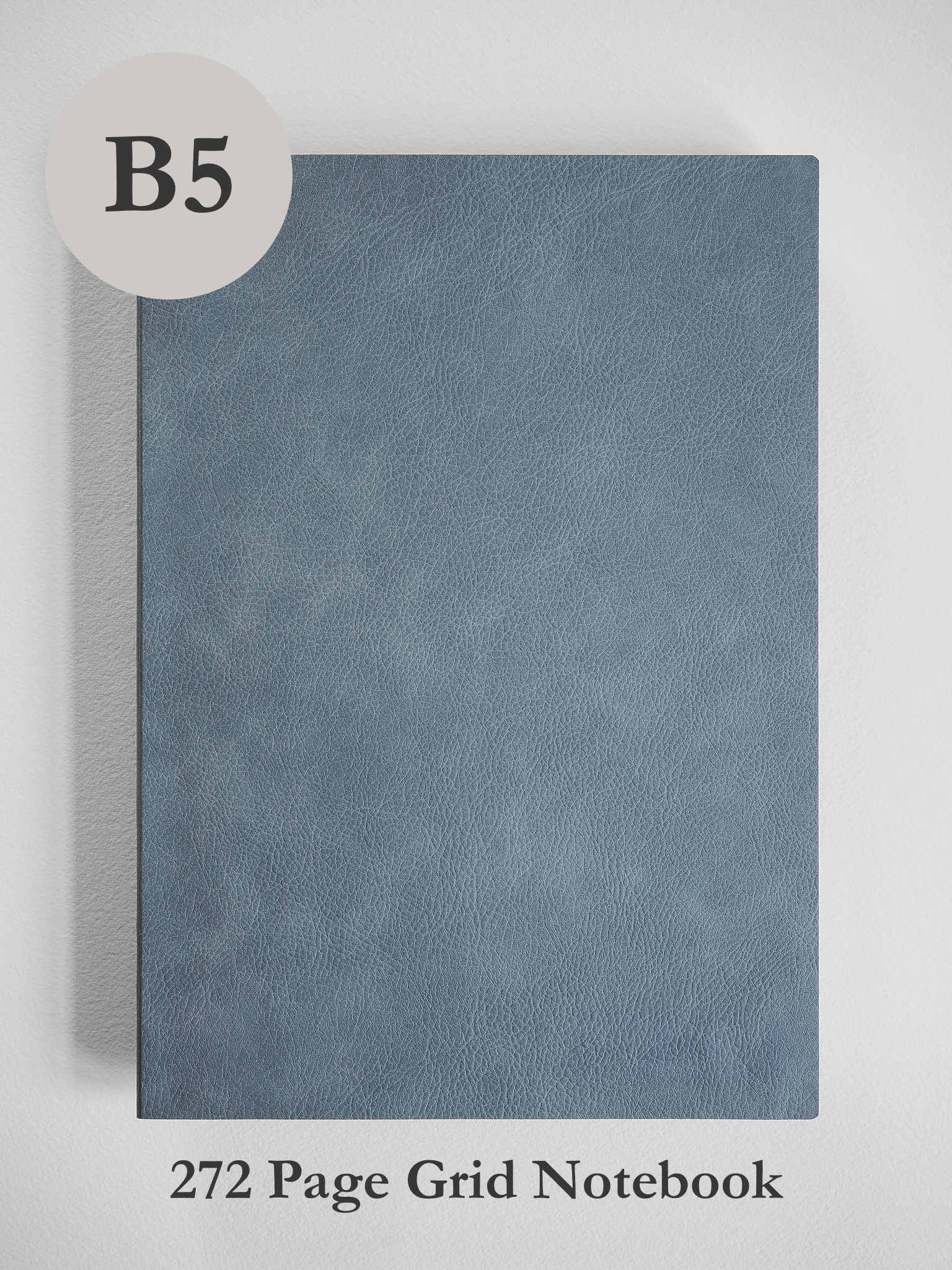 Minimalist B5 notebook featuring a solid, textured slate gray faux leather cover, perfect for notes and journaling.