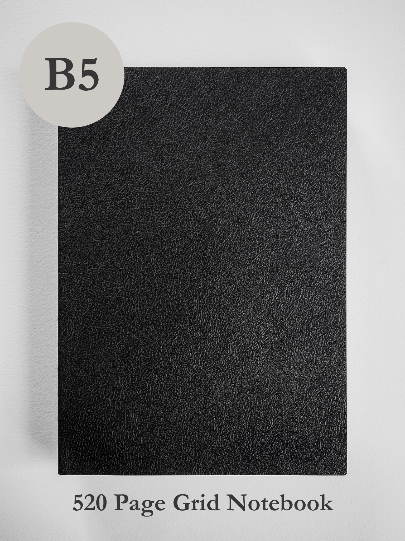 Sleek, matte black B5 notebook featuring a smooth, sophisticated faux leather cover designed for 520 pages of detailed writing.