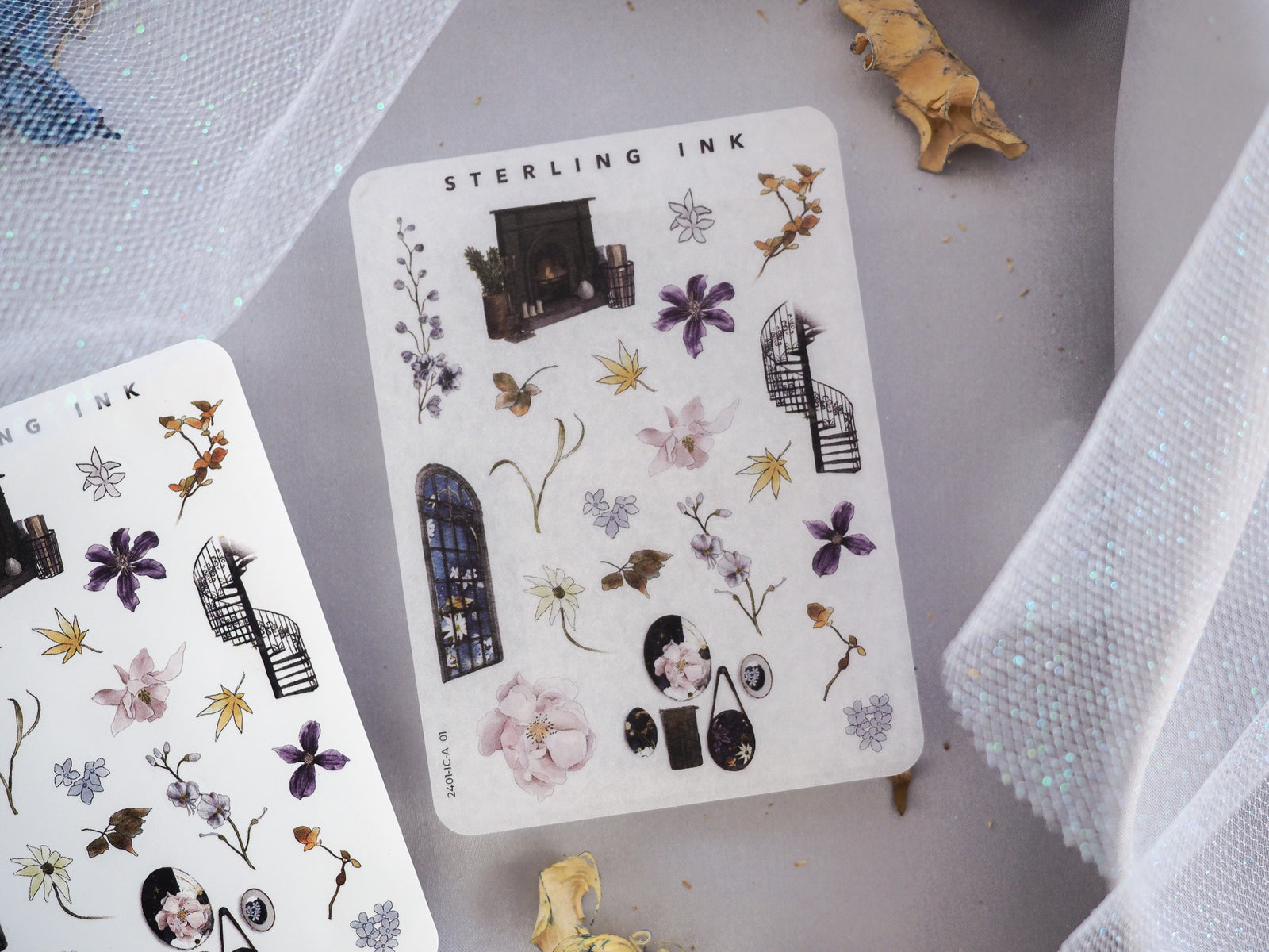 Mini decorative sticker sheet featuring black ink icons of vintage architecture, elegant staircases, and delicate floral elements for journaling and planning.