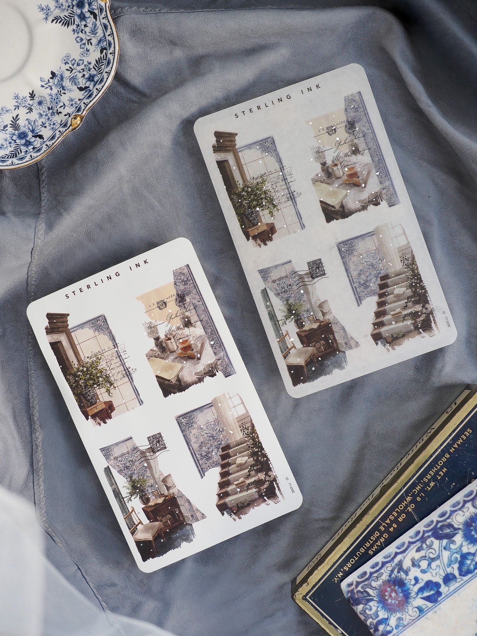 Festive "Sterling Ink" collage stickers for journaling, showcasing winter indoor scenes like decorated windows, fireplaces, and glittering staircase motifs.