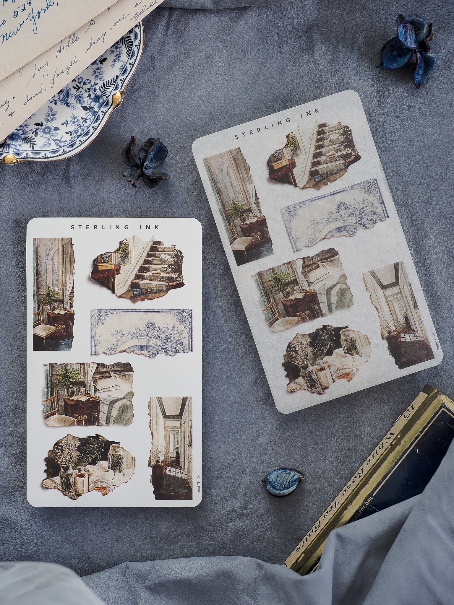 Decorative sticker sheets featuring distressed, torn paper patterns and vintage illustrations of architectural ruins, stairways, and forgotten interiors.