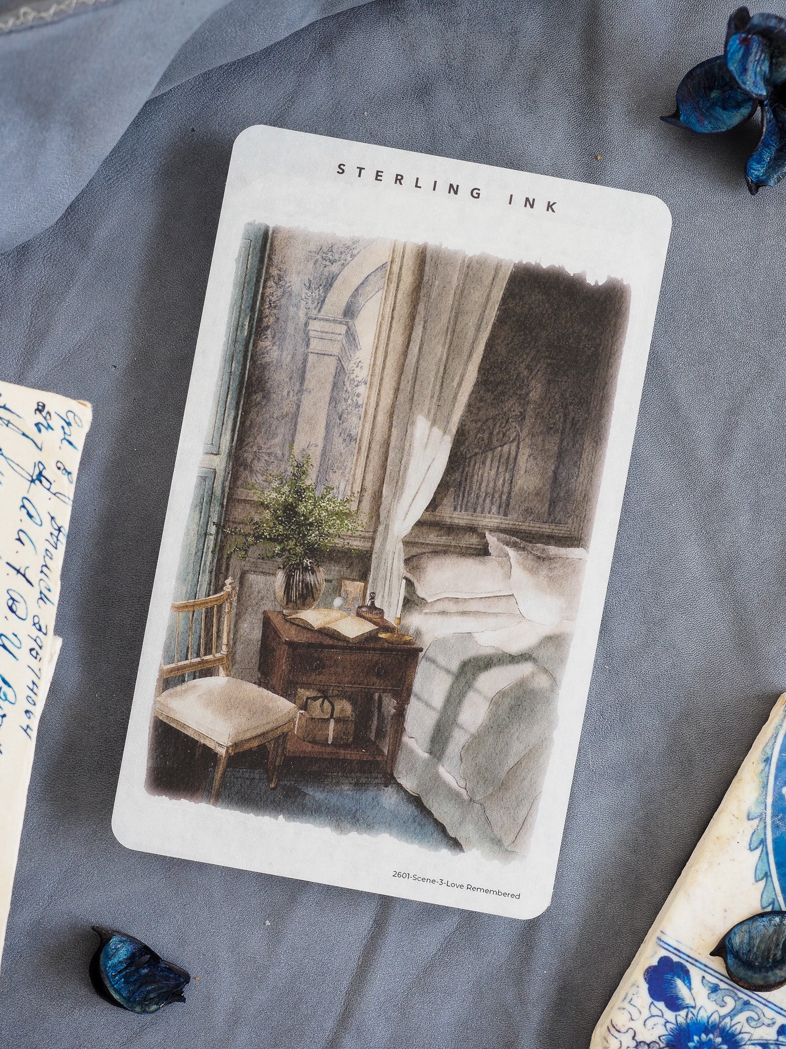 Vintage 'Love Remembered' sticker featuring a sepia-toned, detailed sketch of an antique bedroom setting with draped curtains and a dresser.