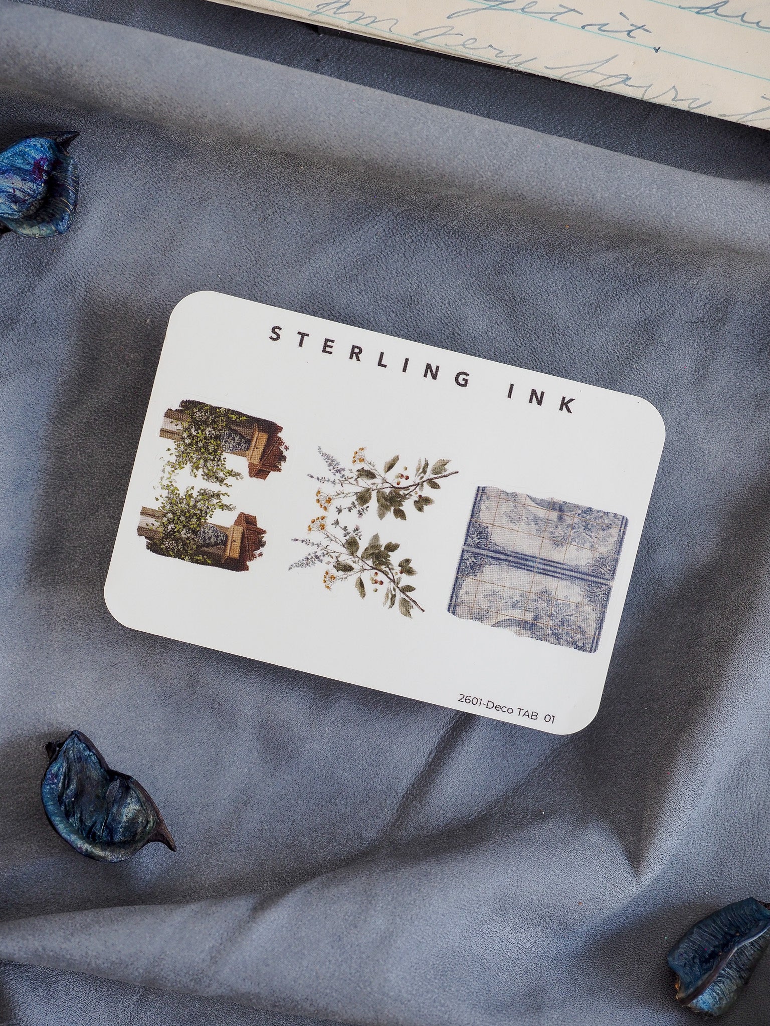 Decorative tab set featuring diverse themes: rustic architecture, elegant botanical illustrations, and patterned distressed blue squares for planning in January 2026.
