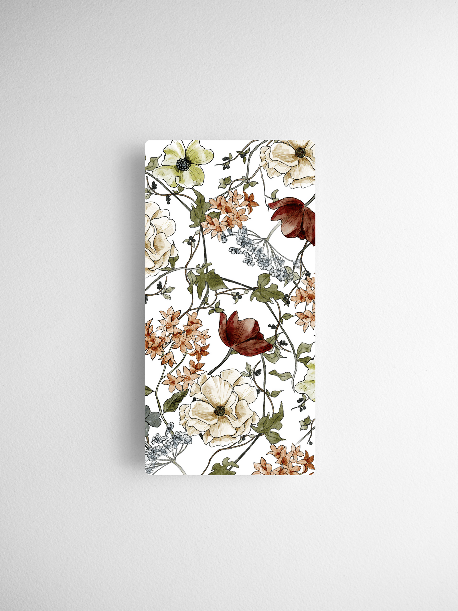 Intricate botanical watercolor card featuring blossoms in cream, deep red, and yellow tones, woven through delicate green foliage and vines.
