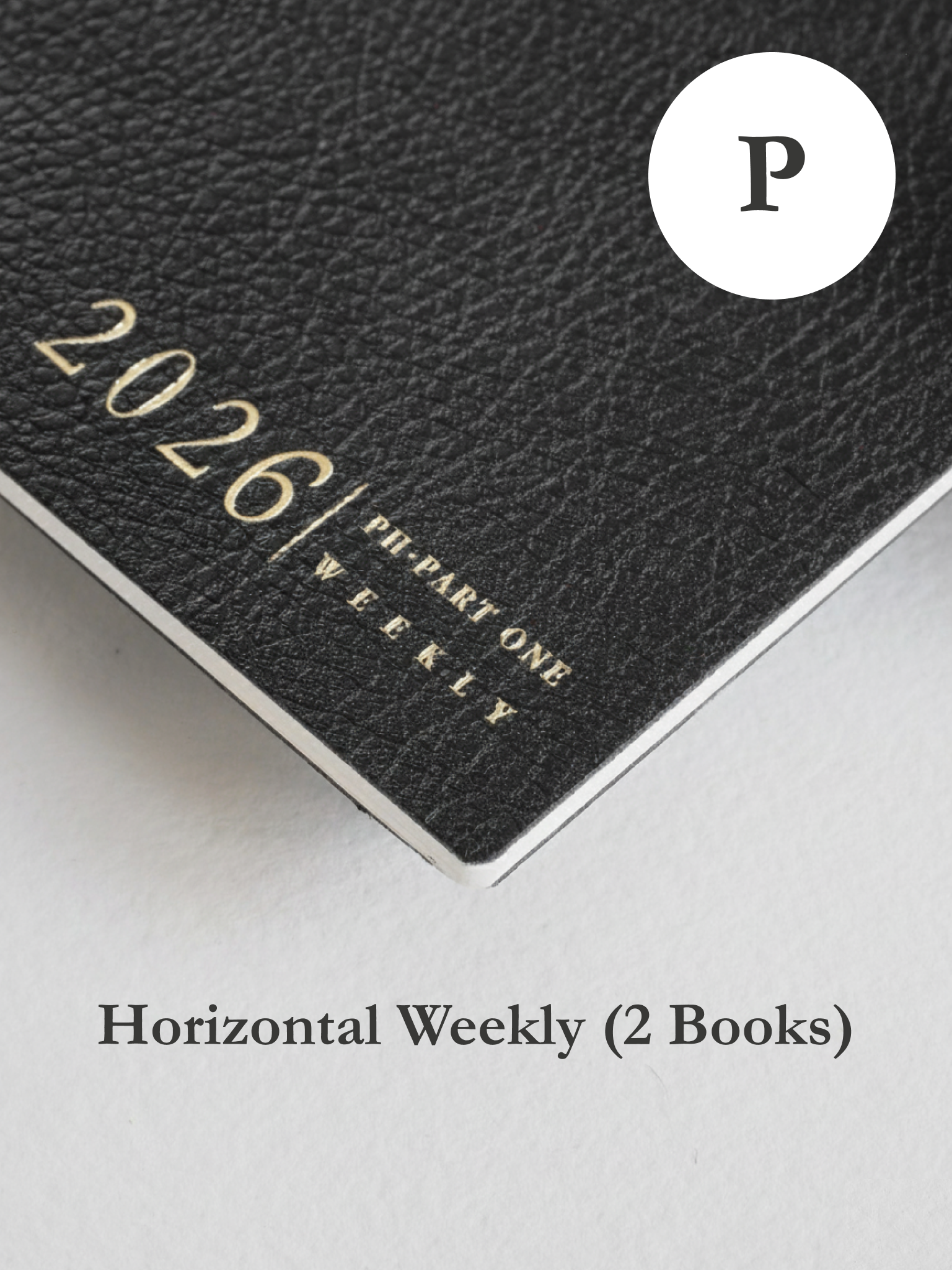 Dark charcoal weekly planner booklet featuring debossed white text reading "2026 PH-PART ONE WEEKLY."