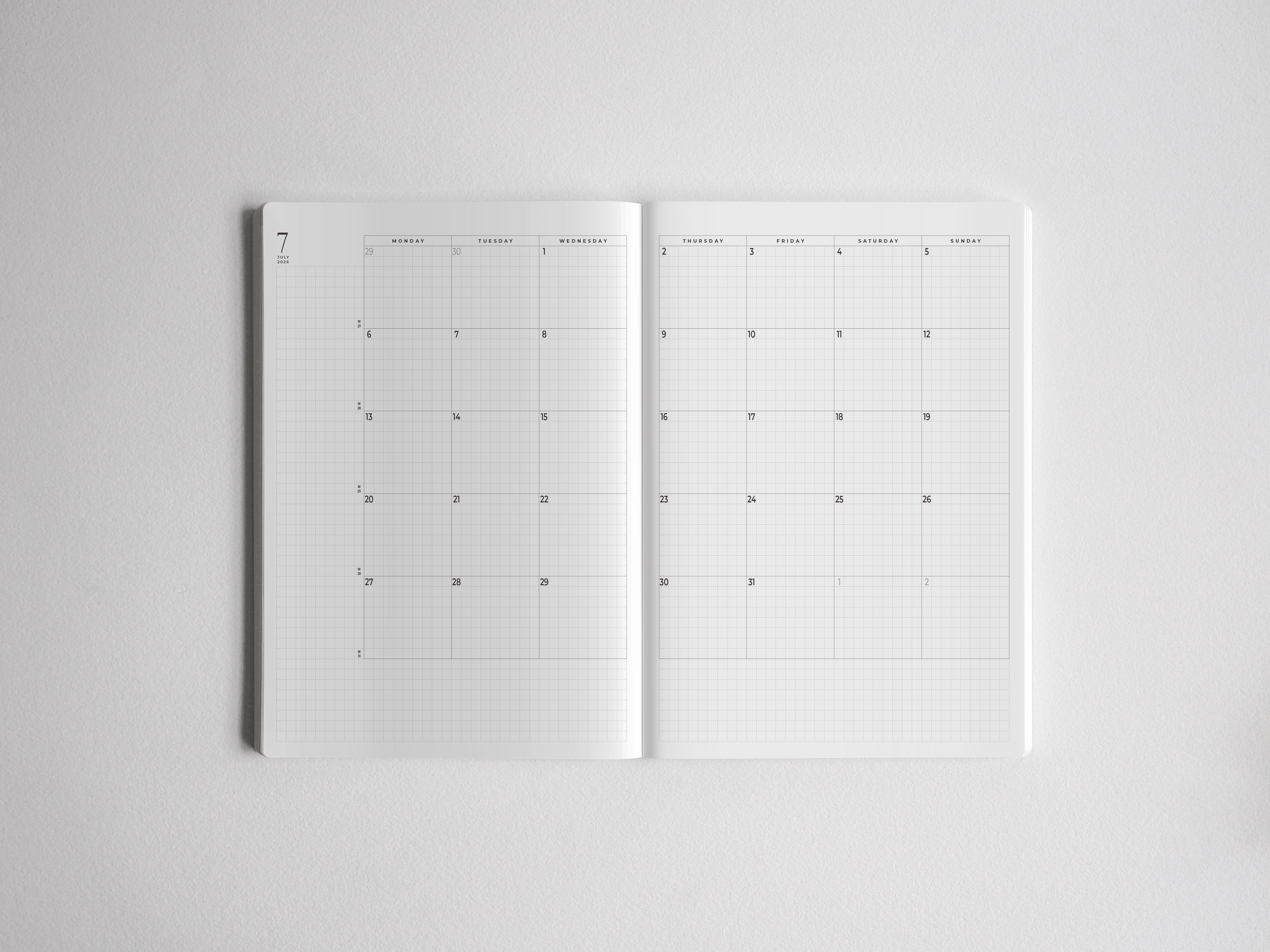 Open A5 academic planner displaying clean, gridded weekly spreads and daily layouts designed for full-year student scheduling and organized note-taking.