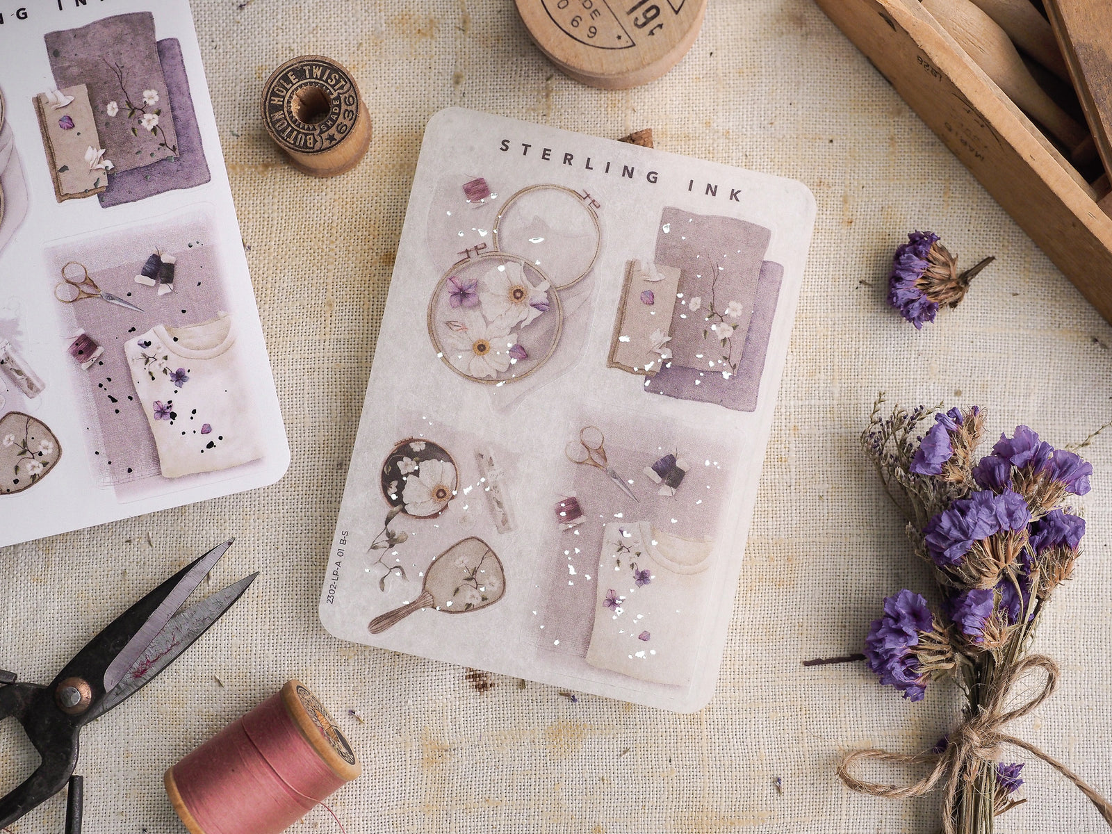 Pastel-toned sticker set featuring large floral illustrations, botanical elements, and delicate silver foil accents for journaling and scrapbooking.