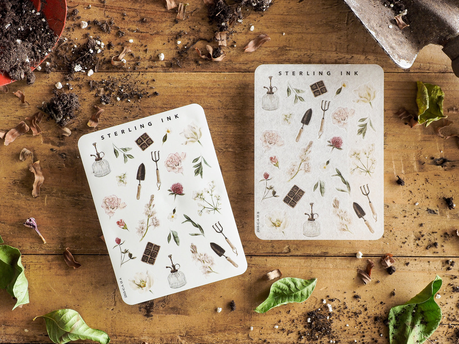 Botanical sticker sheets featuring an array of delicate scientific elements, including mortars, pestles, blooming flowers, and architectural icons, perfect for journaling and scrapbooking.