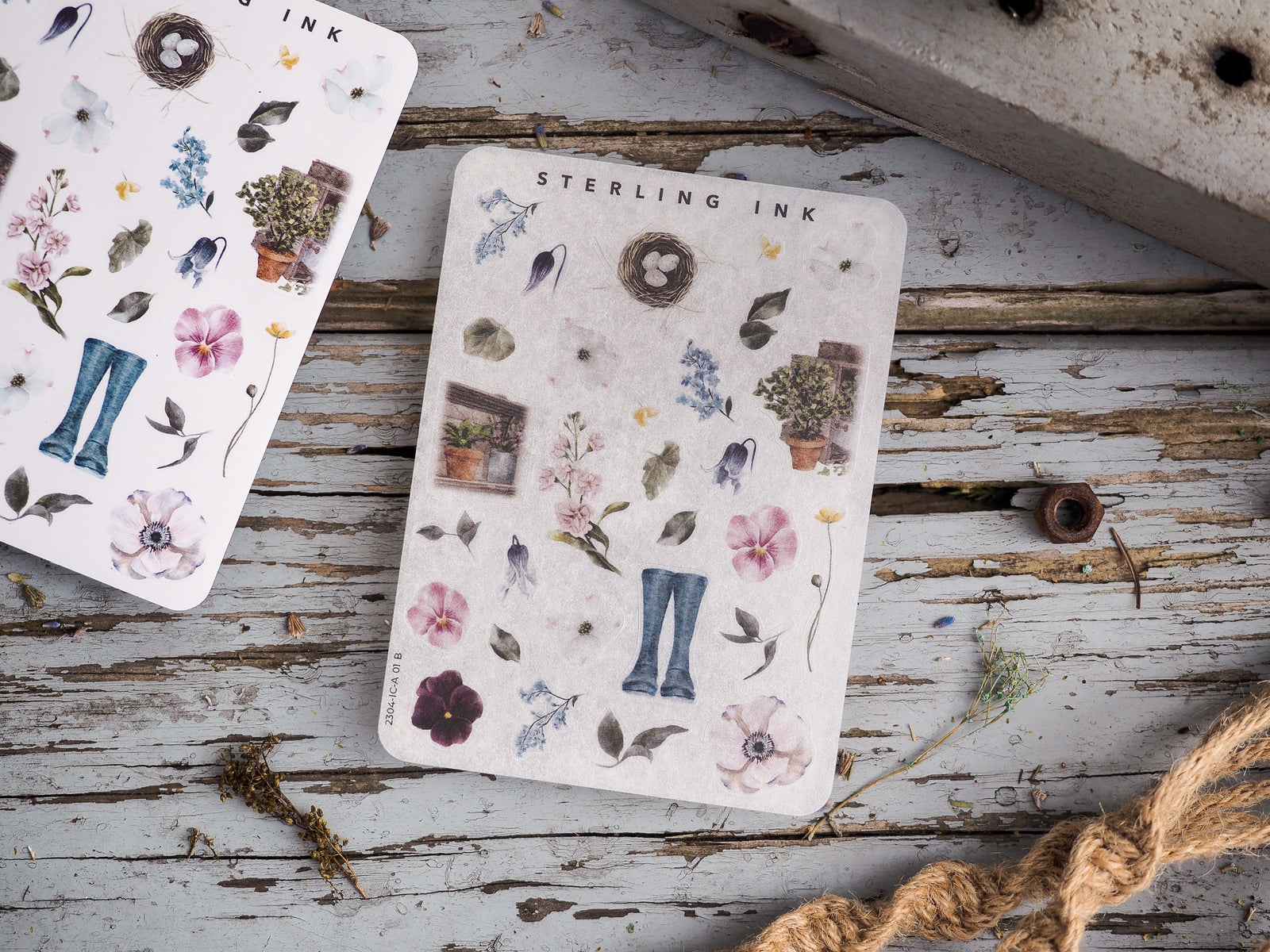Decorative sticker icons featuring a spring botanical theme, including watercolor flowers, natural wreaths, and stylized blue jeans motif.