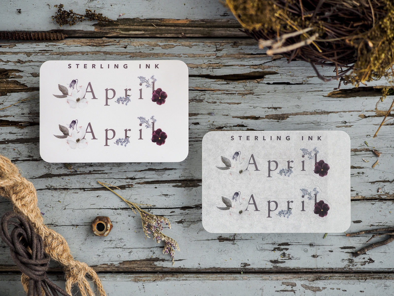 Delicate April month stickers featuring printed botanical designs and purple florals, perfect for organizing and journaling.