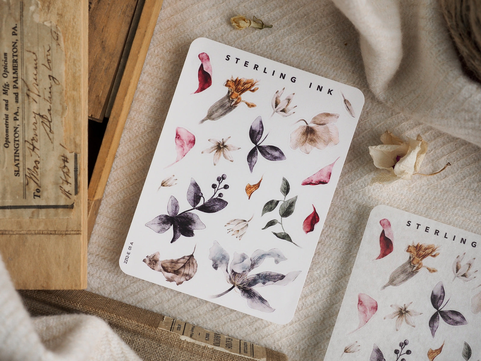 Botanical "Elements Stickers" featuring delicate watercolor illustrations of leaves, flowers, and buds in rich, muted autumnal tones perfect for journaling.