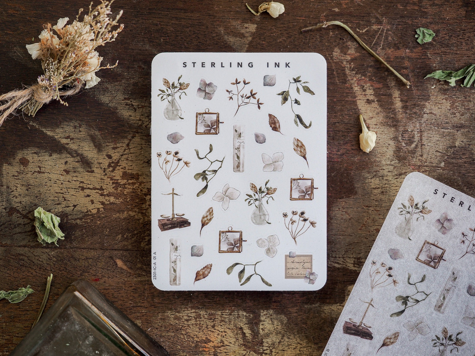 A collection of white sticker icons featuring delicate, vintage black ink botanical illustrations of diverse leaves, flowers, and natural elements.