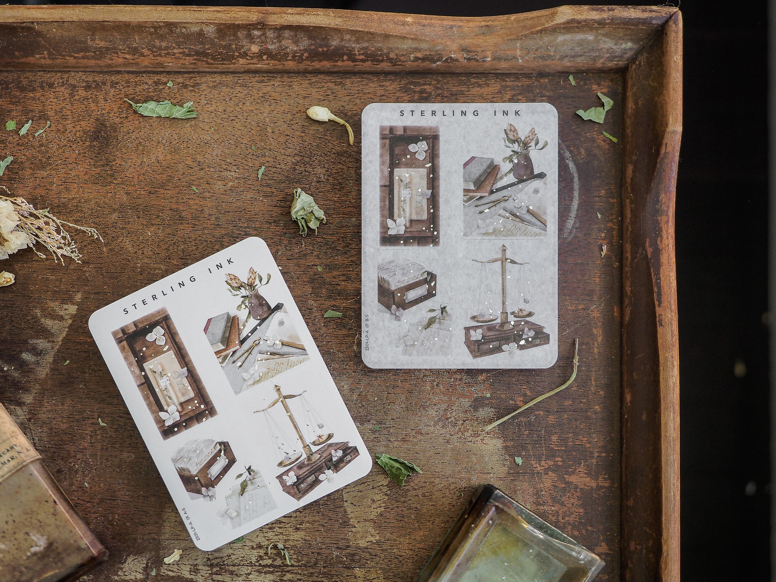 Set of antique sterling ink illustration stickers, featuring detailed historical vignettes, including maritime boats, natural objects, and cozy fireplace mantel scenes.