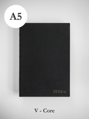 Minimalist black A5 planner cover displaying "2026 | A5" in a refined typeface, perfect for sophisticated full-year organization.