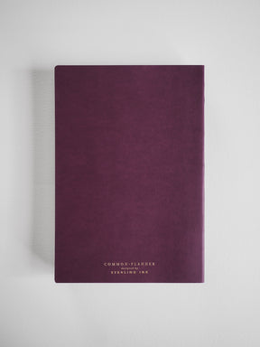 Matte burgundy A5 common planner for 2026, featuring minimalist debossed branding for "Common Planner" and "Syerling Ink."