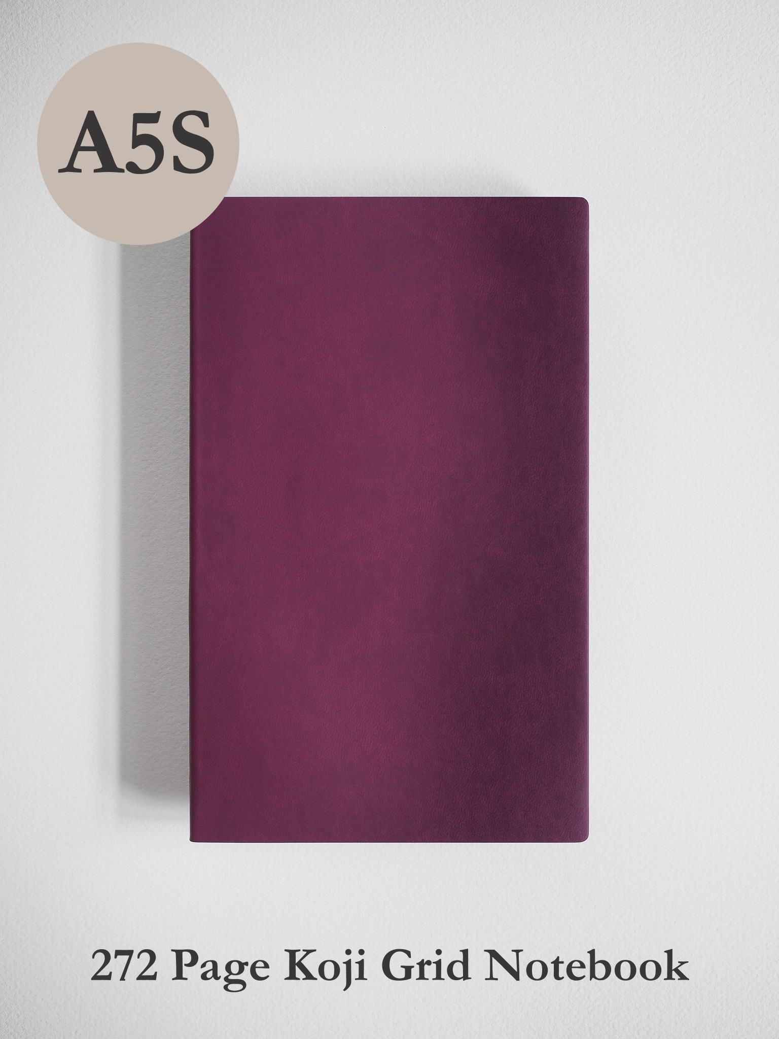 A smooth, solid magenta A5 notebook with a clean, minimalist design, perfect for general note-taking and sketching.