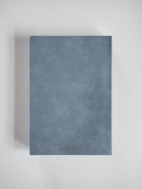 Minimalist A5 vertical planner with a solid slate grey matte cover, designed for the 2026 year.