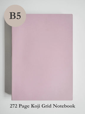 A light pink B5 size koji grid notebook shown against a light gray background, with a beige circle label reading 'B5' in the top left and text at the bottom reading '272 Page Koji Grid Notebook'.
#Color_Fairyfloss