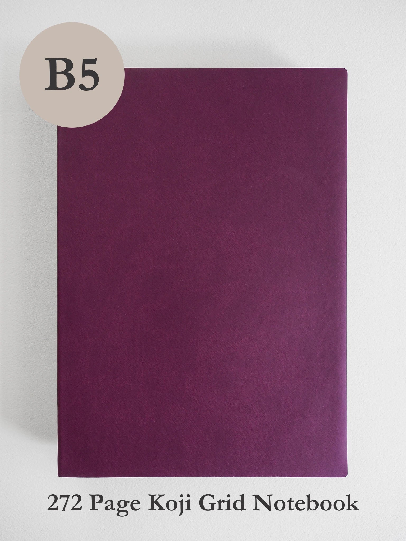 A dark purple 5x5 inch Koji grid notebook shown against a light gray background, with a beige circle label reading 'B5' in the top-left corner and text at the bottom identifying it as a 272 Page Koji Grid Notebook.
#Color_Mulberry