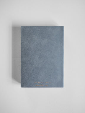 Slate gray B6 vertical common planner with a textured faux leather cover, designed for comprehensive year planning.