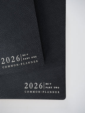 Black faux-leather planner bundle for 2026, featuring two matching B6 covers labeled 'Part One' and 'Part Two' in elegant, coordinating typography.