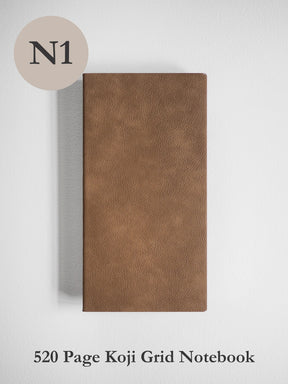 Brown notebook with textured cover on a white background
#Color_Caramel