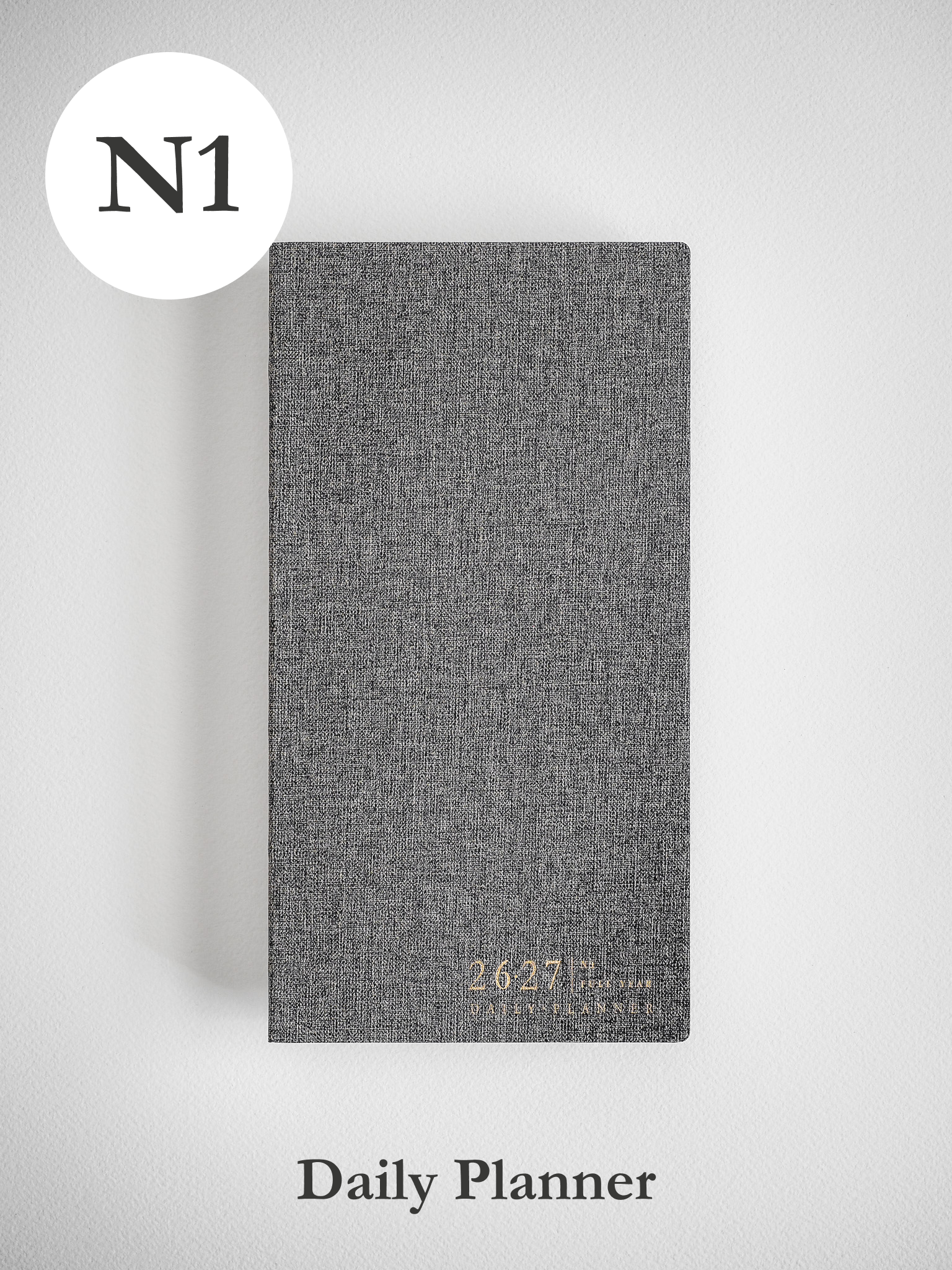Textured dark gray academic daily planner for 2026-2027, featuring printed yearly academic details on the front cover.