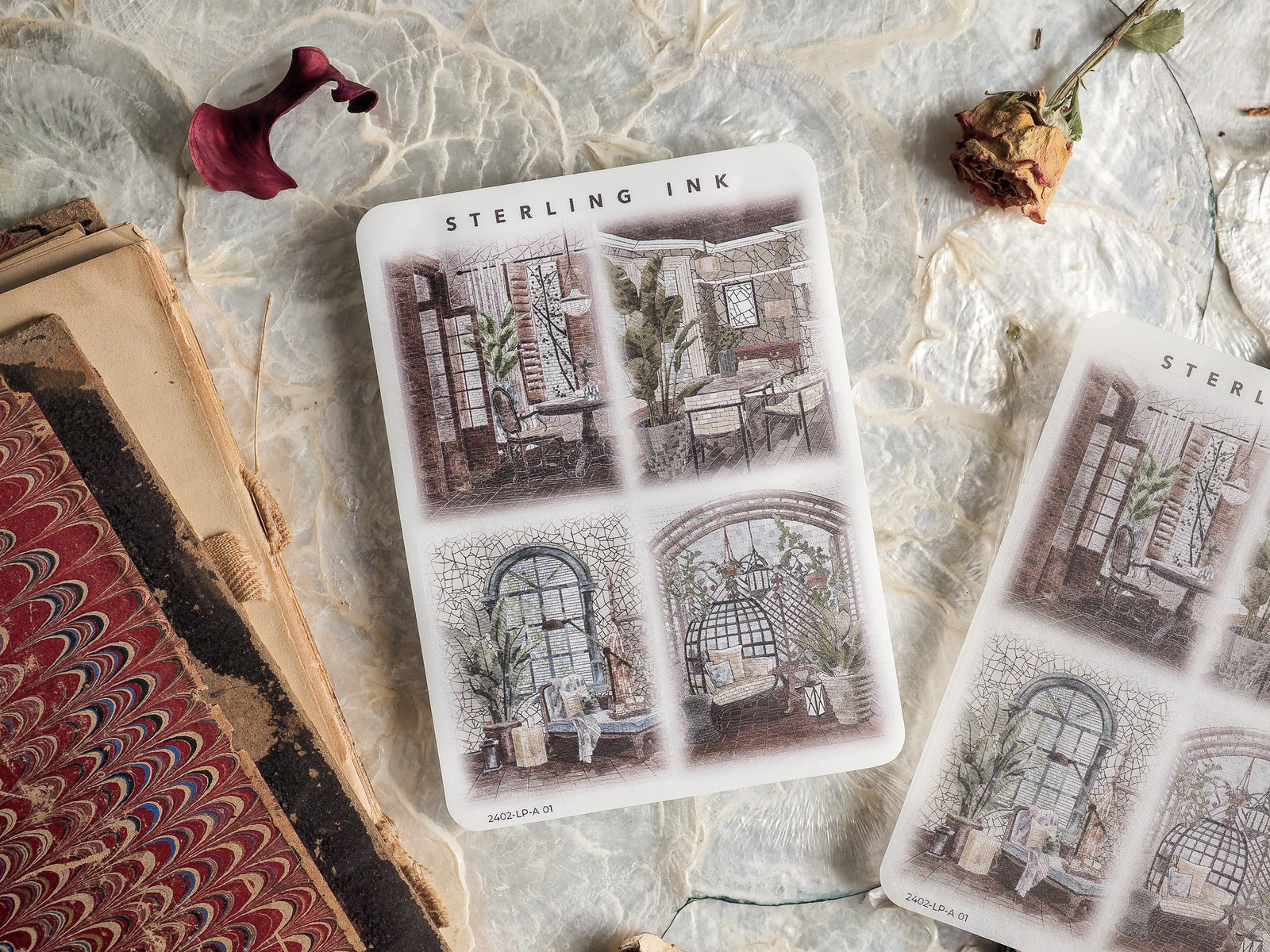 Sheet of vintage, sepia-toned illustration stickers featuring architectural sketches of quaint windows and cozy interior domestic scenes for February 2024.
