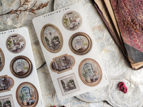 Sepia-toned sticker sheet featuring multiple ornate frame designs and vintage engravings of historic windows and charming architectural scenes.