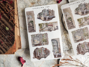 A sheet of vintage, sepia-toned stickers depicting highly detailed, overgrown architectural ruins with distressed, torn paper edges.